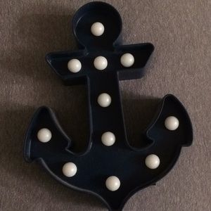 This is a blue anchor that lights up and hangs